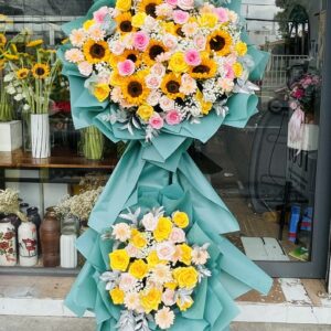 Kệ hoa chúc mừng K62